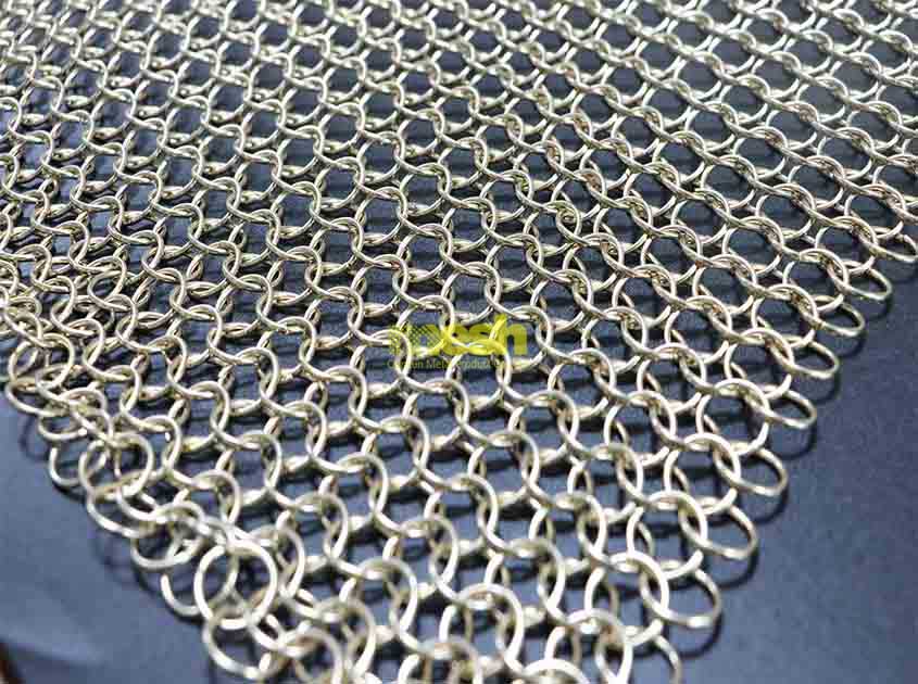 What are the applications of Ring Mesh Curtain in architectural designs