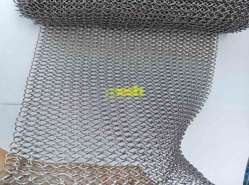 How does Ring Mesh Curtain contribute to energy efficiency in buildings