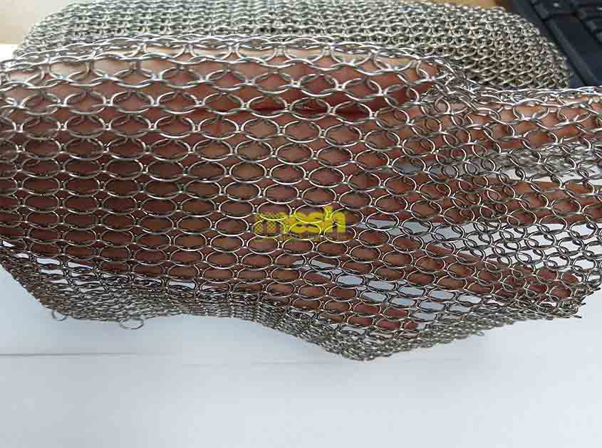 What are the fire-resistant properties of Ring Mesh Curtain