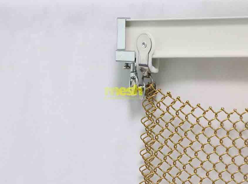 How does Metal Coil Drapery provide a sense of openness in interior designs