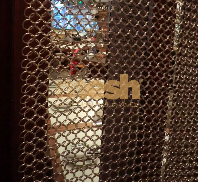 Ring Mesh Curtain: Merging Form and Function in Architecture